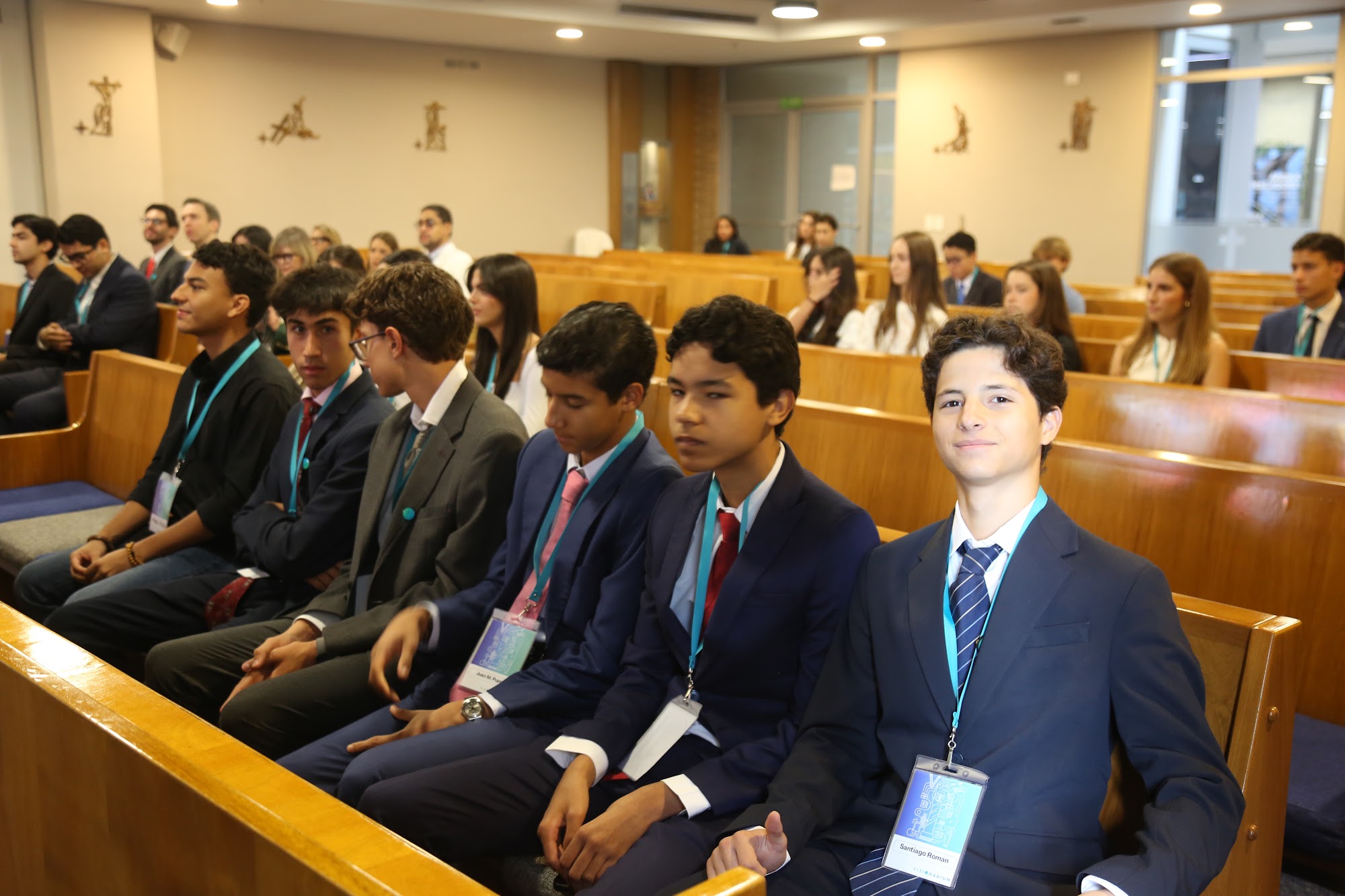 Rows of students seated in the school chapel for the opening.