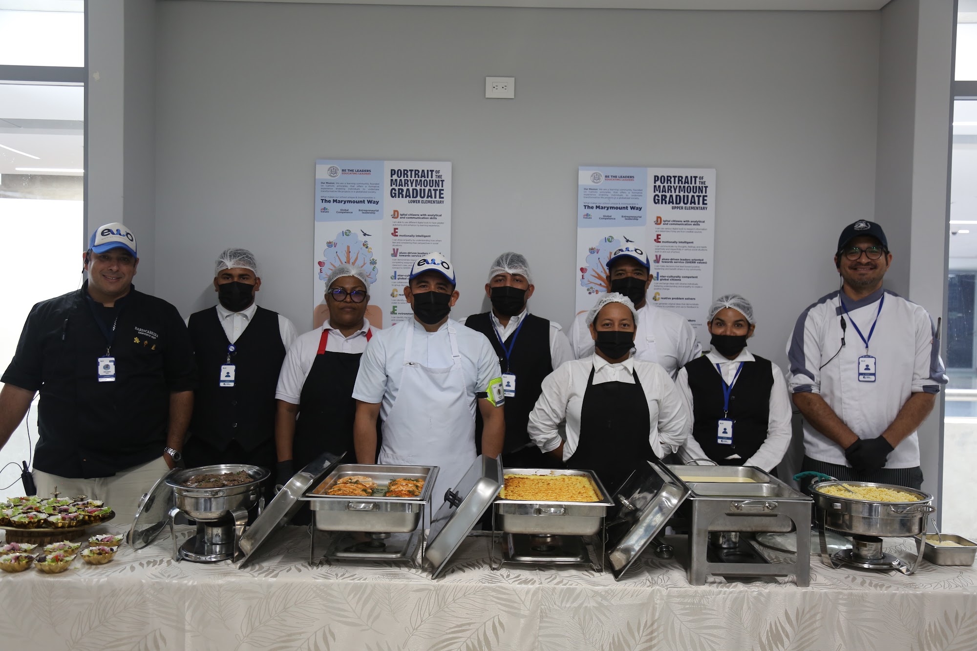 The catering team behind the buffet.