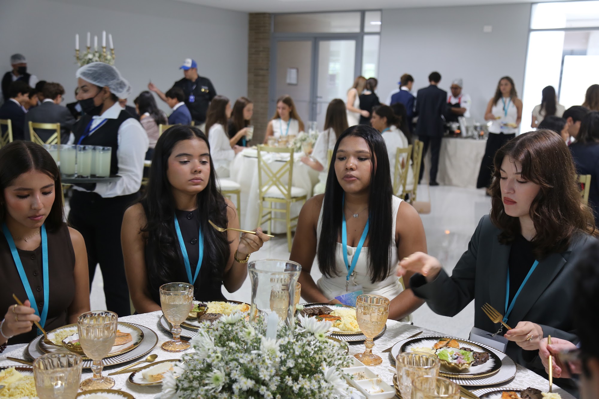 A candid moment at one of the lunch tables.