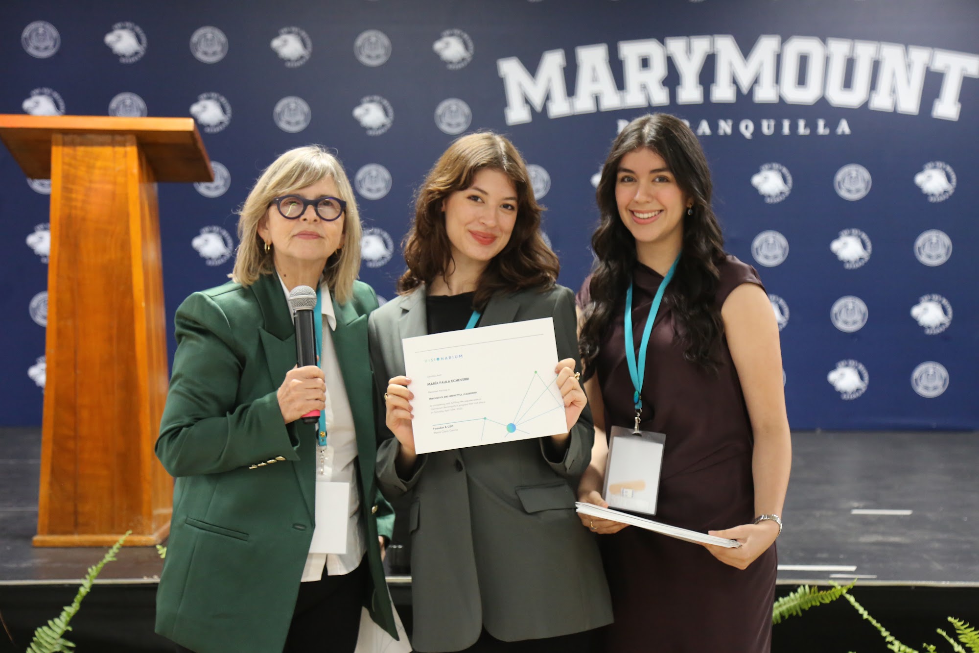 Students receiving their certificates at the close of the day.