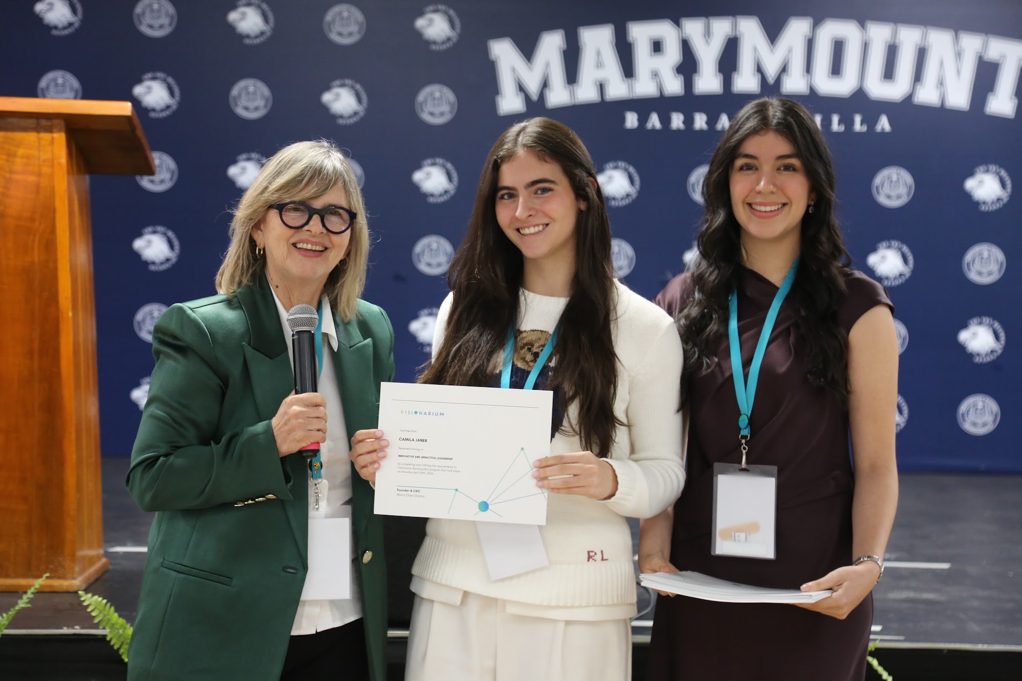 Students receiving their certificates at the close of the day.