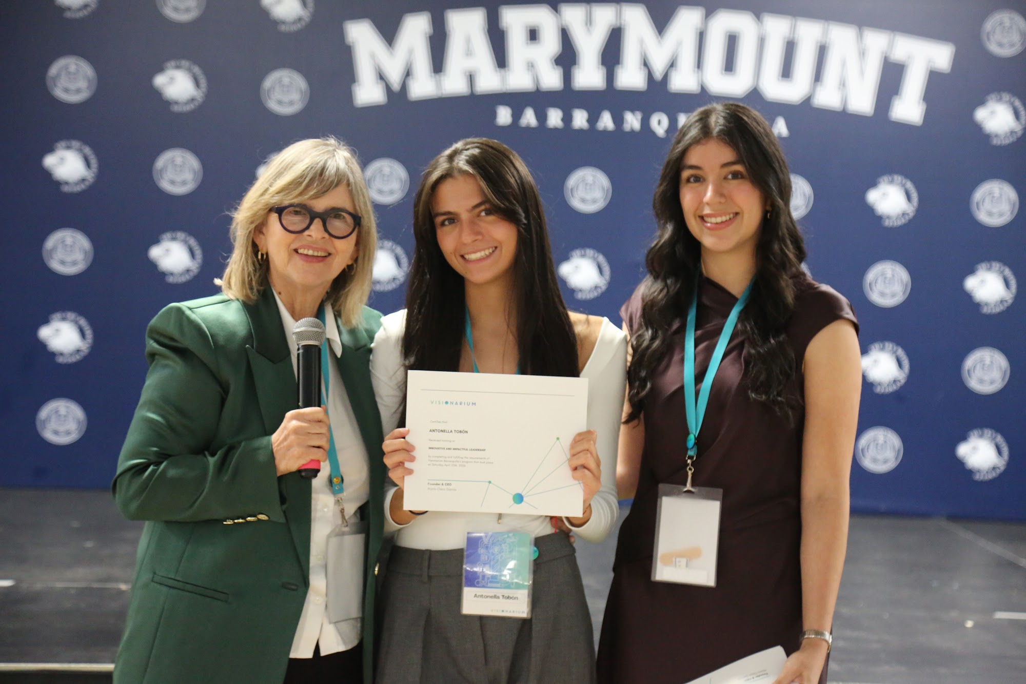 Students receiving their certificates at the close of the day.