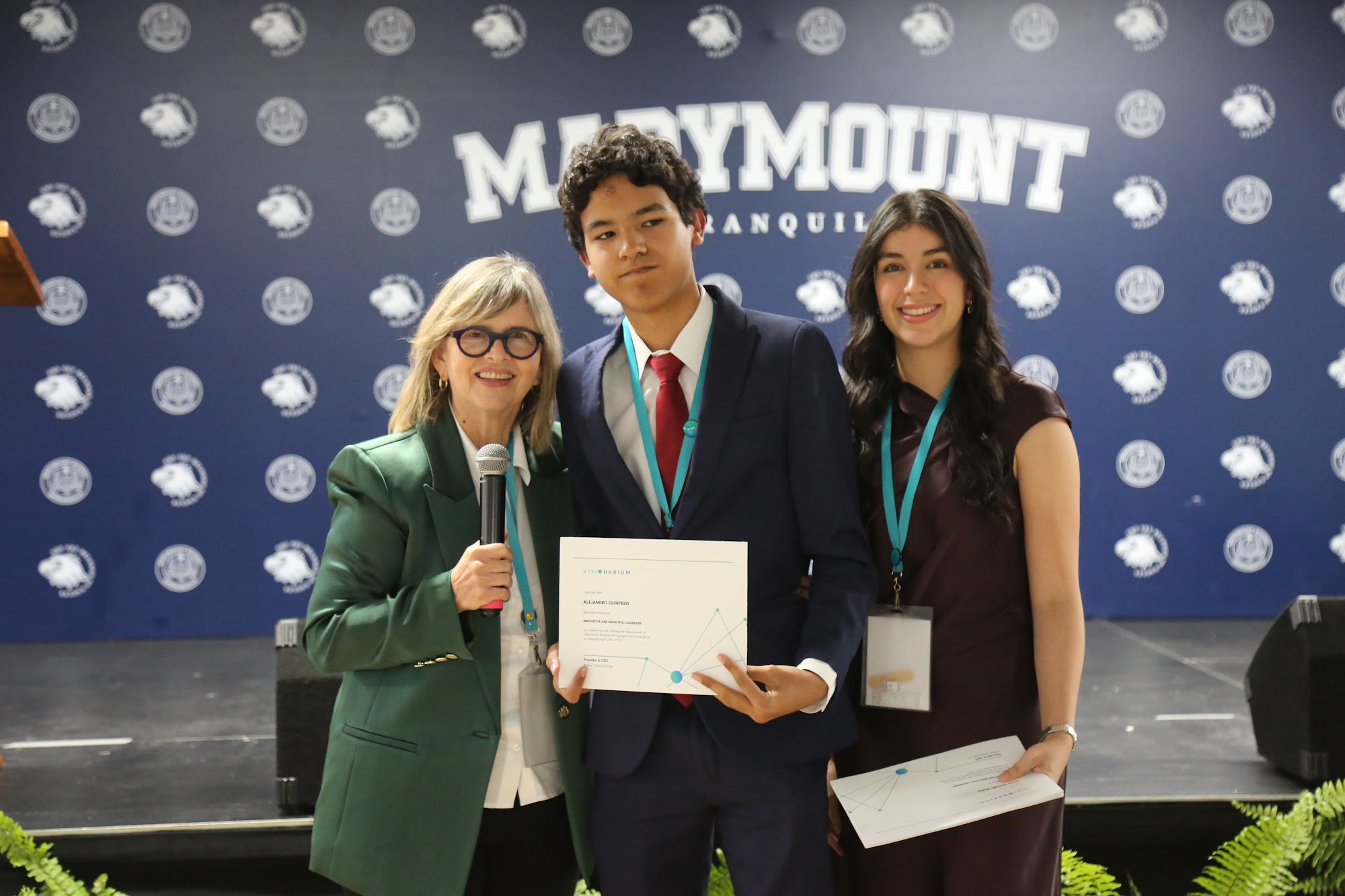 Students receiving their certificates at the close of the day.